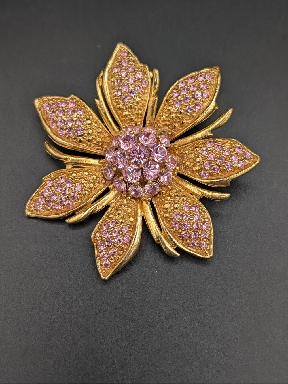 Vintage Pink Rhinestone Flower Brooch Gold Tone Textured Floral Pin Made in USA